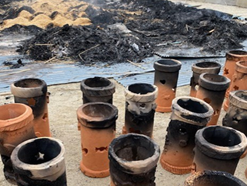 The haniwa is removed from the kiln Phot