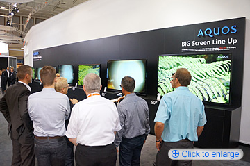 Sharp Shows Off Large-Screen LCD TV Lineup In addition to its 90-inch monitor—the world’s largest of its kind—Sharp presented a lineup of 80-inch, 70-inch and 60-inch monitors. Visitors experienced the overwhelmingly dynamic images of soccer games and movies.