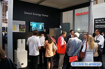 Sharp demonstrated a miniature solar house equipped with see-through solar cell modules  Visitors learned how they could check the amount of solar power being generated—as well as the amount of power consumed by electric appliances—via an HEMS terminal. They also discovered how they could manage the rate of power saving through simple operation.